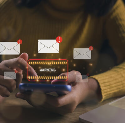Businesswoman sees alerts about cyber risks